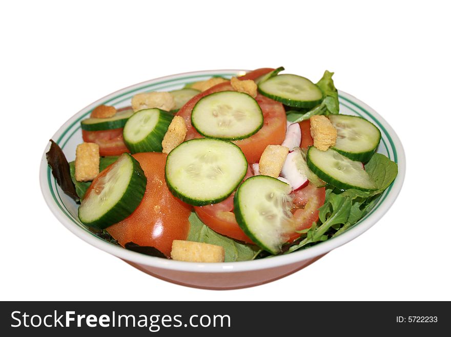 Isolated bowl of green salad with various greens, cucumber, tomato, radish and croutons. With clipping path. Isolated bowl of green salad with various greens, cucumber, tomato, radish and croutons. With clipping path.