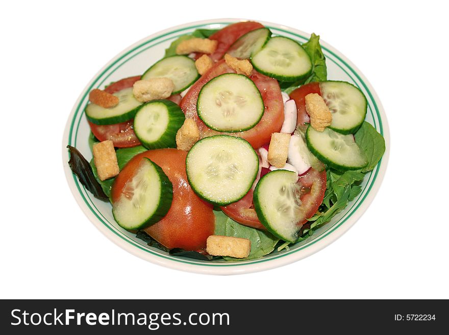 Isolated bowl of green salad with various greens, cucumber, tomato, radish and croutons. With clipping path. Isolated bowl of green salad with various greens, cucumber, tomato, radish and croutons. With clipping path.