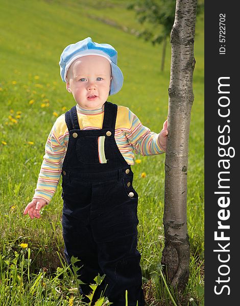 Portrait child near tree