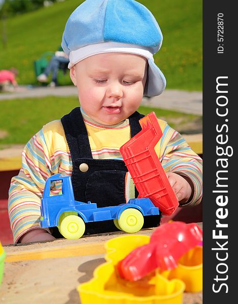 Child and toy car outdoor