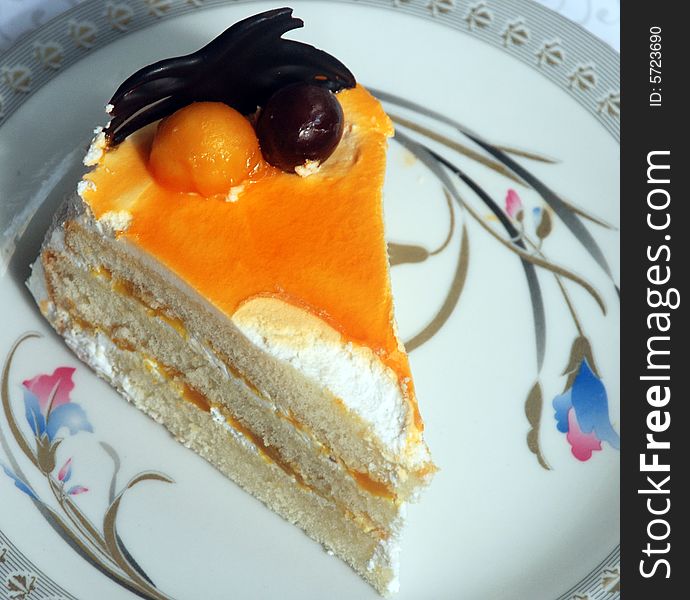 Yummy mango pastry with layers of mango sauce and cream