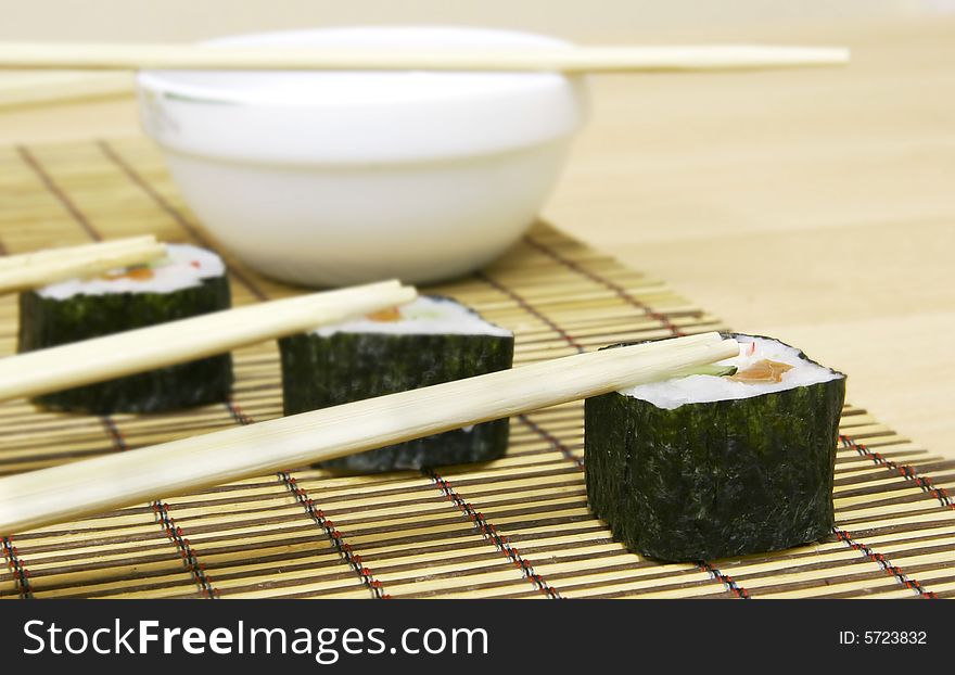 Sushi with chopsticks