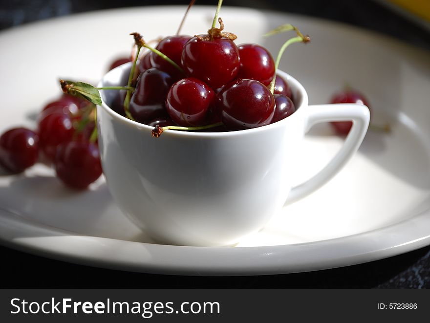 Sour Cherries In A Coffee Cup