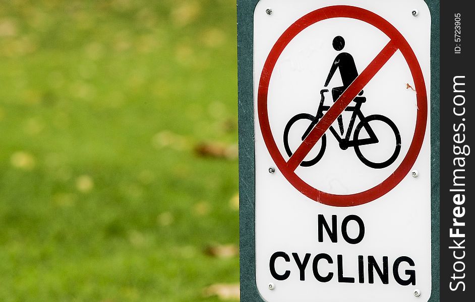 A sign banning the use of bicycles in the park. Photo by Daniel Gregoric. A sign banning the use of bicycles in the park. Photo by Daniel Gregoric