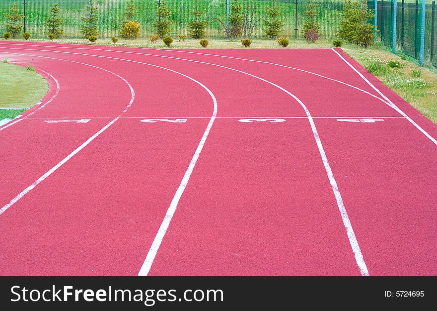 Four tracks of the red athletic track. Four tracks of the red athletic track