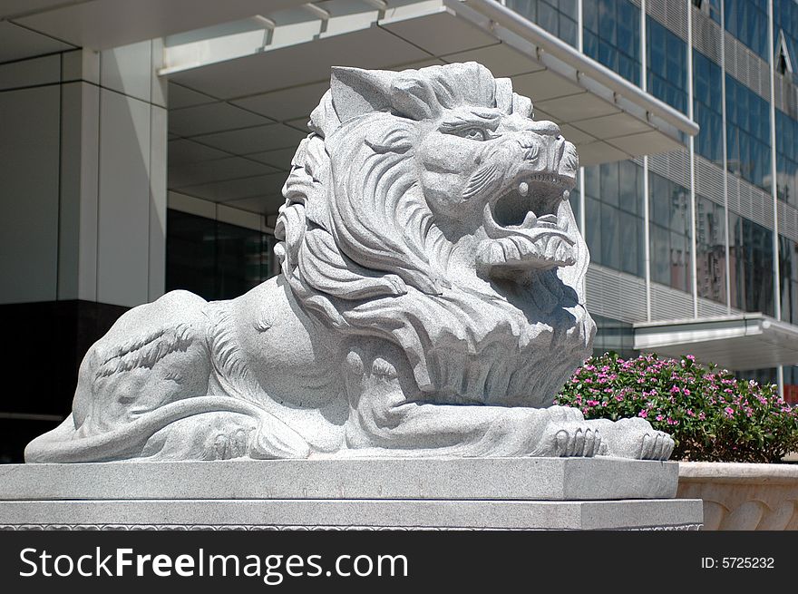 China, lion as guard in front of office's building. China, lion as guard in front of office's building.