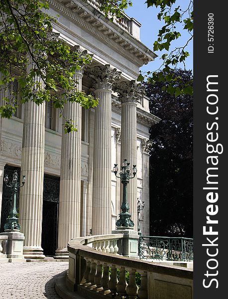 Four stone concrete columns with ornate pedestals. Four stone concrete columns with ornate pedestals