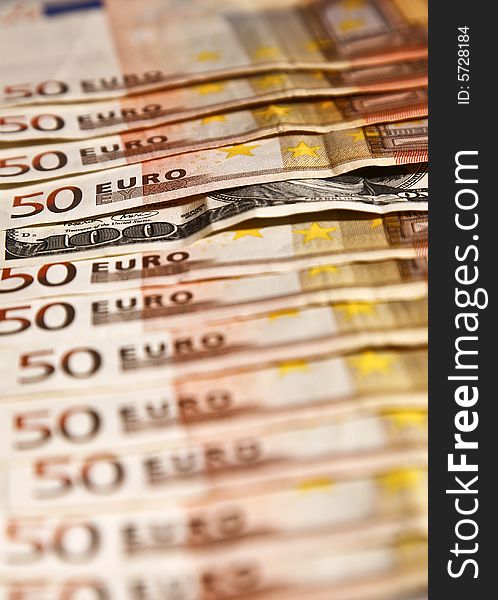 Euros with one hundred dollars paper currency filling all picture. Euros with one hundred dollars paper currency filling all picture.