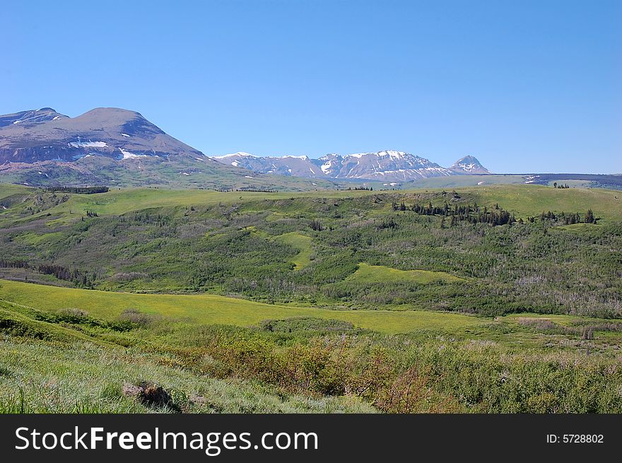 Mountains and hillside grassland in waterton lakes national park, alberta, canada. Mountains and hillside grassland in waterton lakes national park, alberta, canada