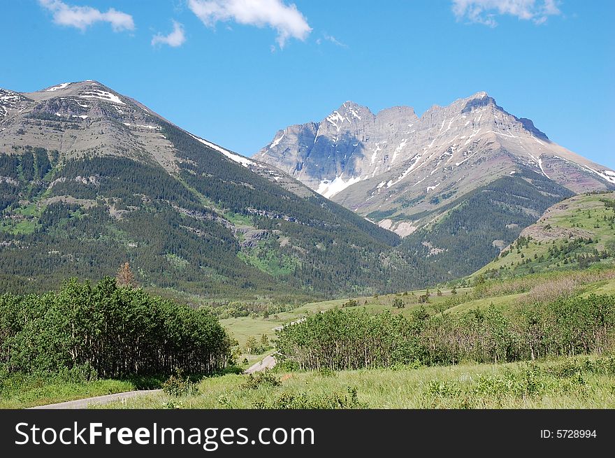 Mountains and hillside grassland in waterton lakes national park, alberta, canada. Mountains and hillside grassland in waterton lakes national park, alberta, canada