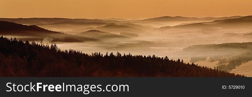 Morning fog in the panoramic landscape