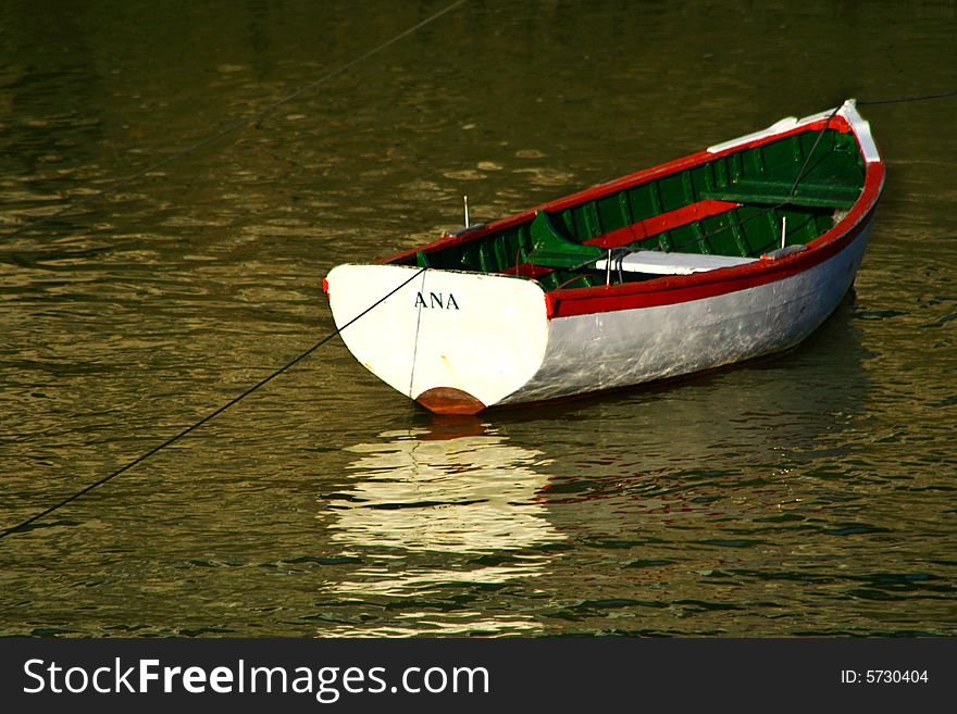 An image of an small boat in the water