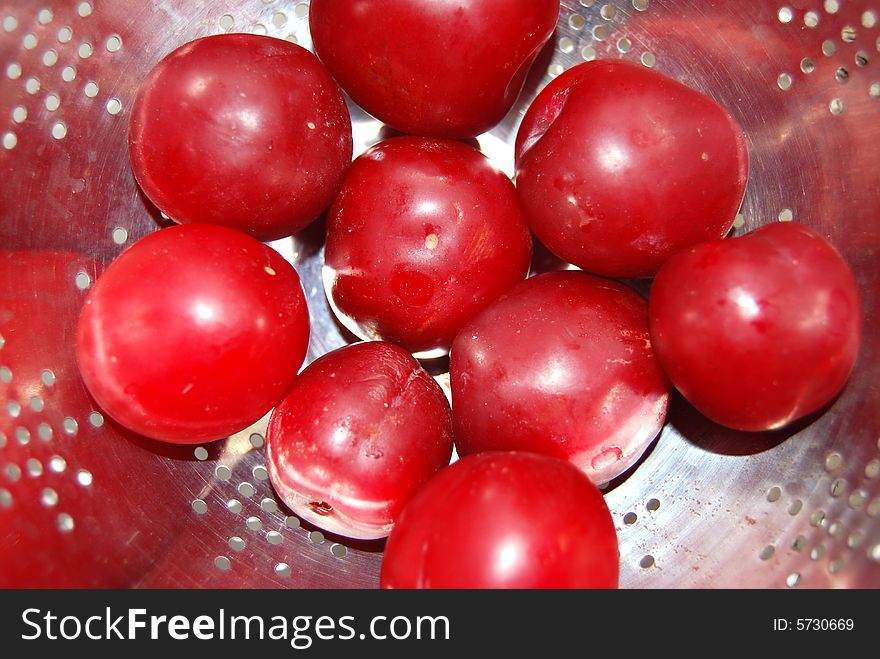 Plum, red, berry, colander, food, objects, juicy. Plum, red, berry, colander, food, objects, juicy