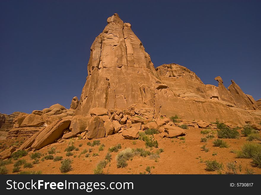 Soaring sandstone rock formations in Arches National Park, Moab, Utah.