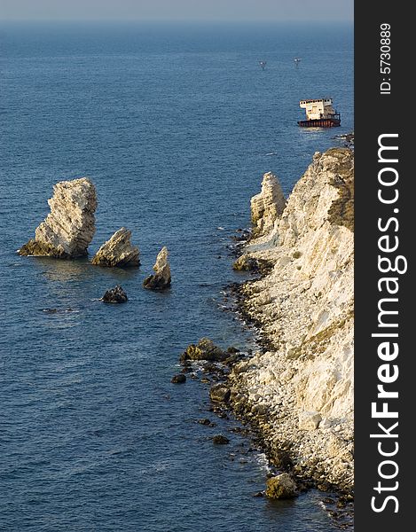 Rocky Coastline At Sunset Time