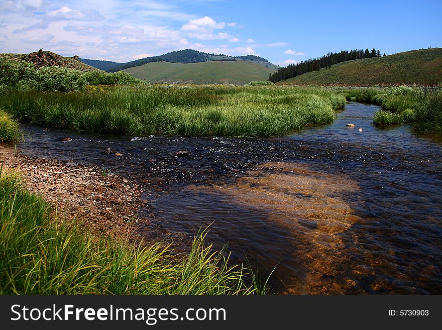 Stanley Creek as it flows through high mountain meadow, Stanley Idaho. Stanley Creek as it flows through high mountain meadow, Stanley Idaho