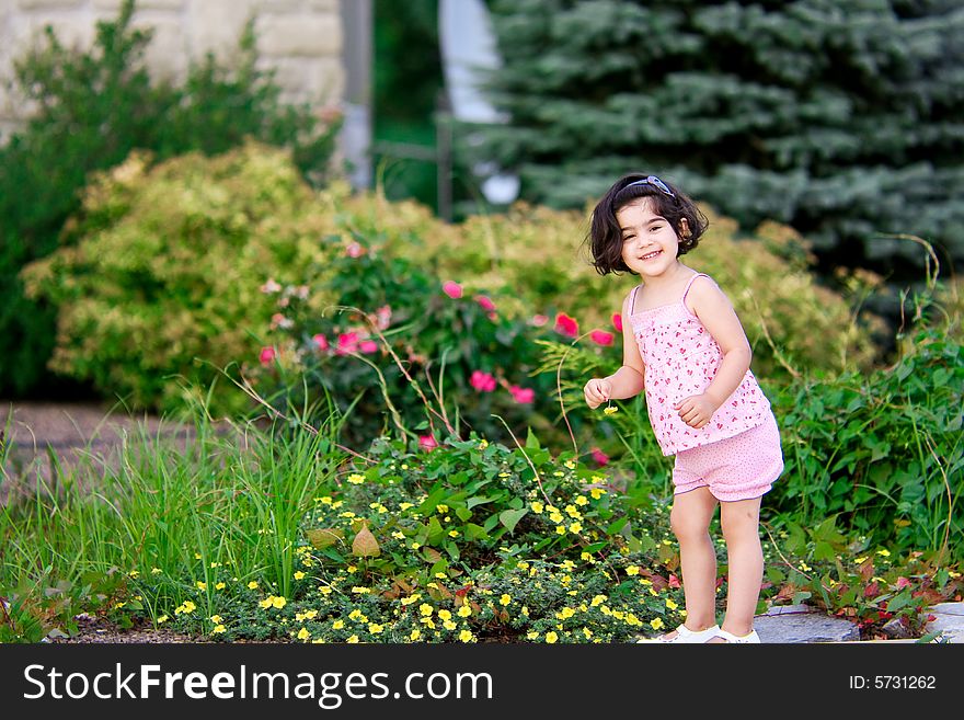 Girl in flower garden