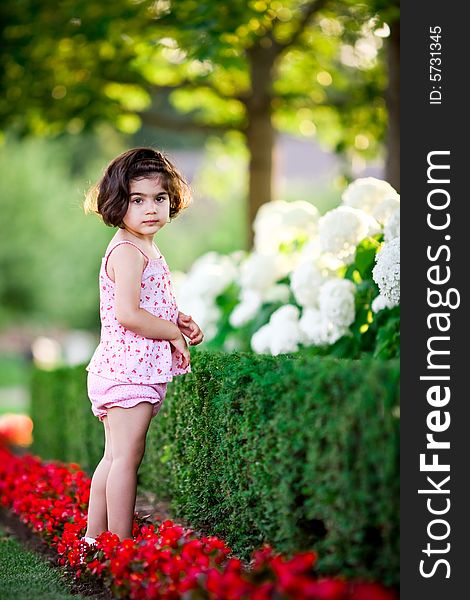 Girl in flower garden