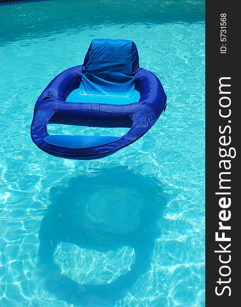 Blue lifebuoy on my swiming pool