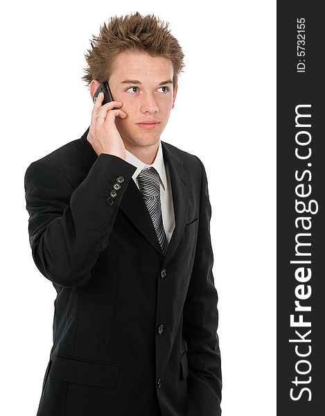 A young businessman on his pda device. A young businessman on his pda device