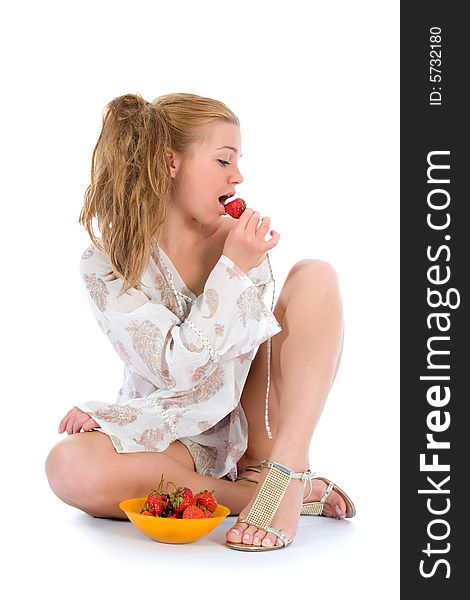 Beautiful girl with strawberry over white