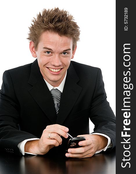 A young businessman on the phone in his office