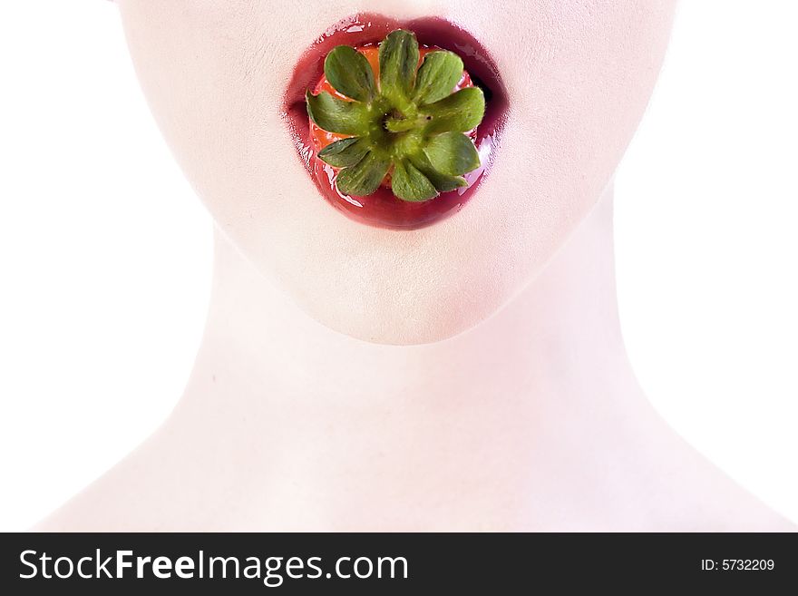 Girl with strawberry in her lips. Girl with strawberry in her lips