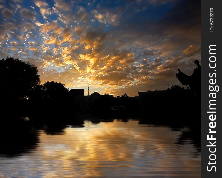 Orange color morning cloud on reflected water surface. Orange color morning cloud on reflected water surface