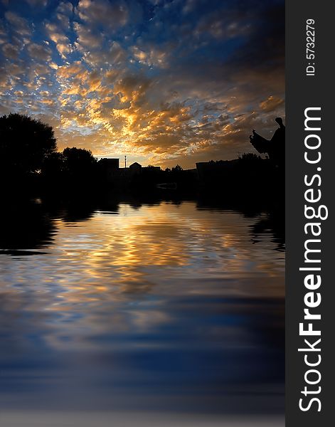 Orange sunrise on reflected water surface. Orange sunrise on reflected water surface