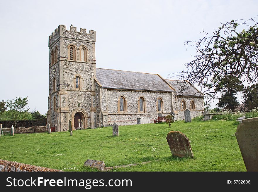 A village church from a view across the graveyard