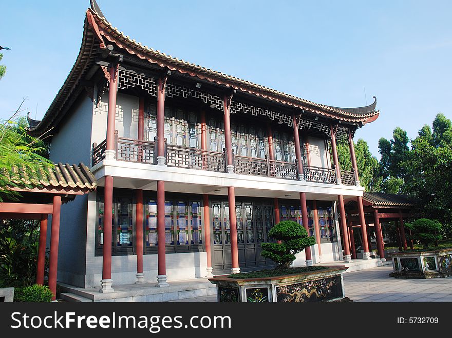 The ancient Chinese storeyed house in the traditional garden. The ancient Chinese storeyed house in the traditional garden.