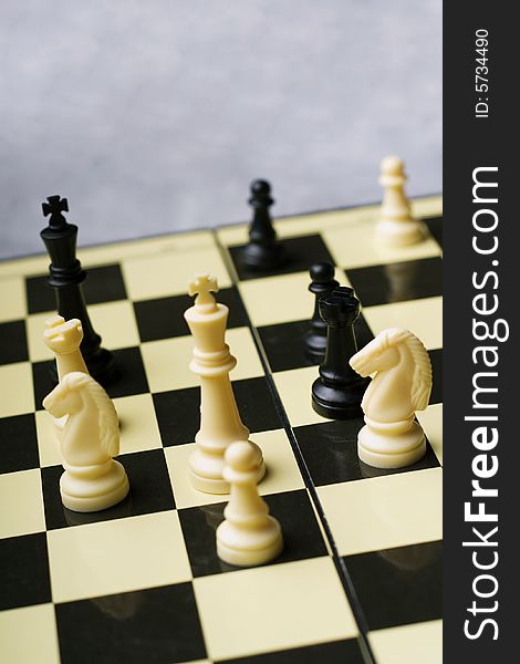 A close-up view of a chess board game. A close-up view of a chess board game.