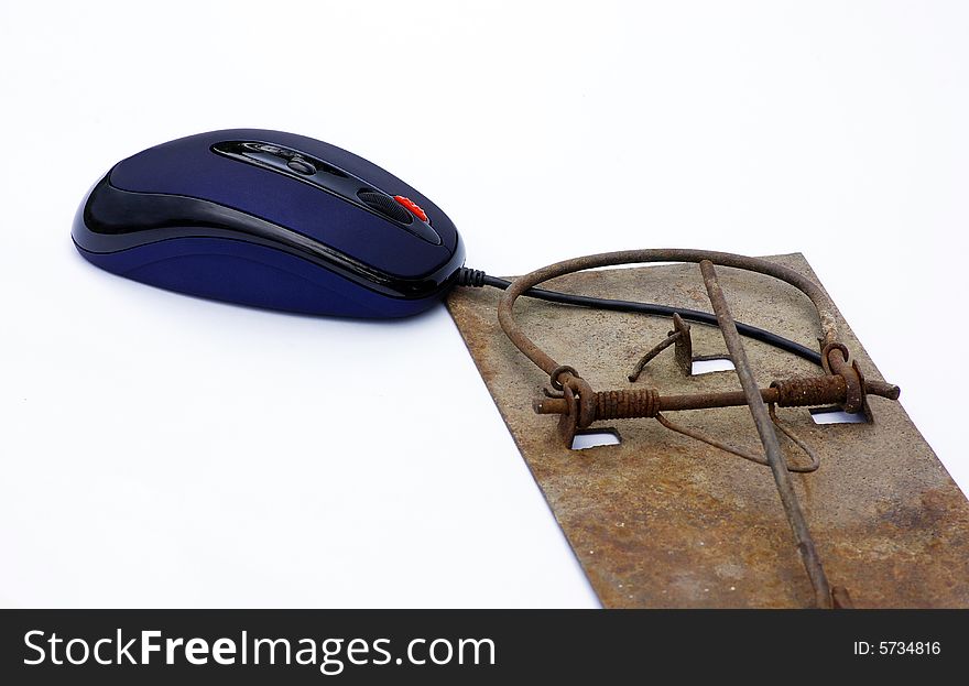 A computer mouse is in a trap