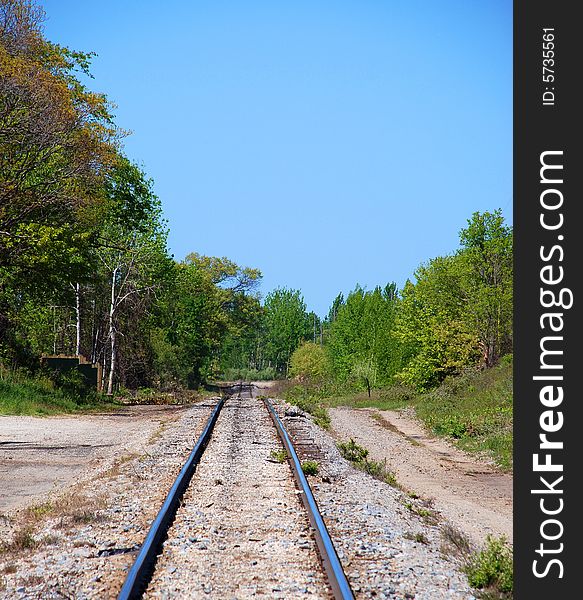 A fantastic place where this old abandoned rails of the train cargo carriers from the past, coming into Ludington, Michigan.  This town is very historic with a diverse train rail system. A fantastic place where this old abandoned rails of the train cargo carriers from the past, coming into Ludington, Michigan.  This town is very historic with a diverse train rail system.