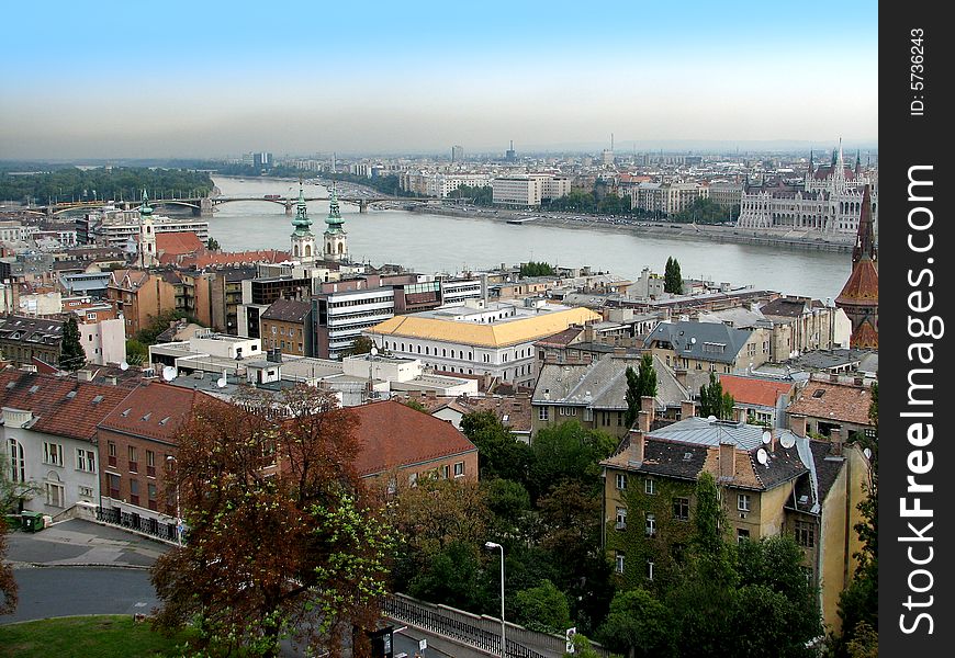 The city of Buda and Pest separated by Danube river separating. The city of Buda and Pest separated by Danube river separating