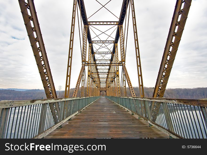 View of footbridge over reservoir for hikers and bikers.