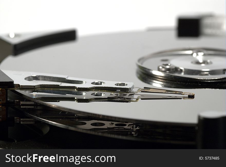 Close up  of an opened hard disk. Close up  of an opened hard disk