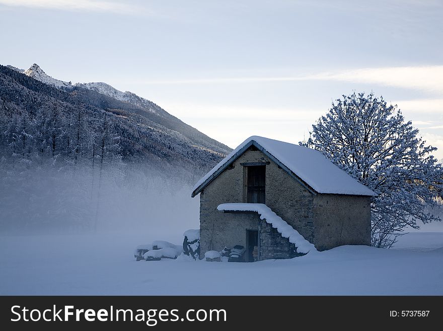 A snowy winter scene with refuge. A snowy winter scene with refuge
