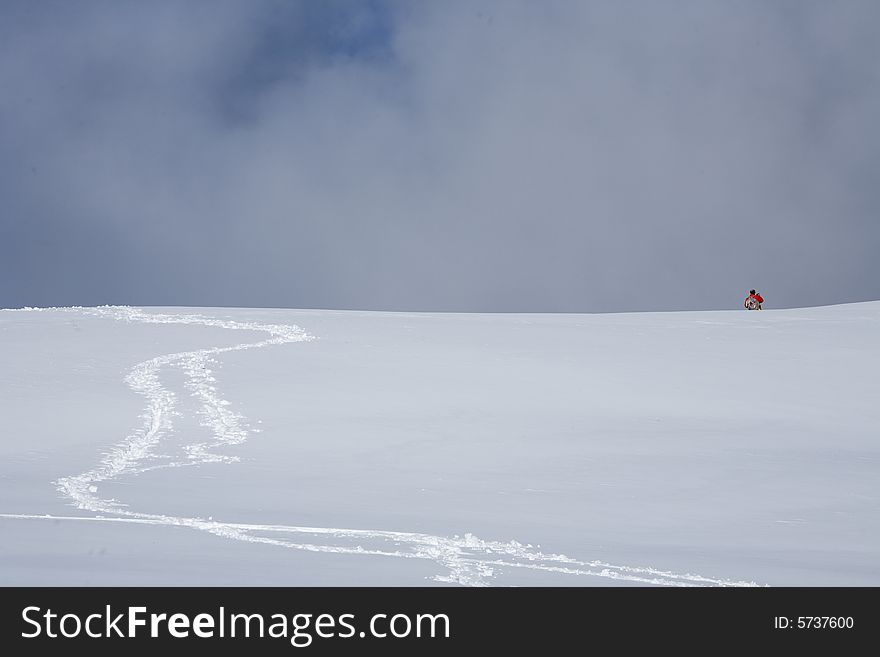 A snowy winter scene with skier. A snowy winter scene with skier