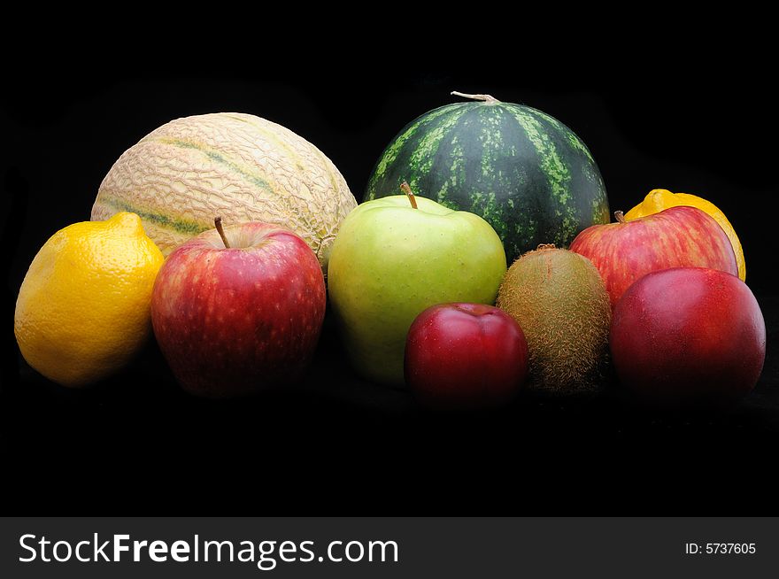 Composition of different fruits isolated on black background. Composition of different fruits isolated on black background
