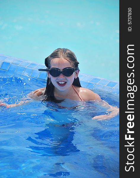 Young Girl In Swimming Pool