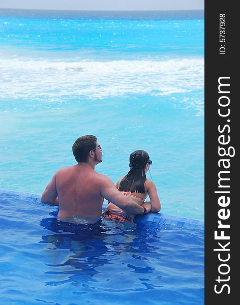 Father and daughter swimming