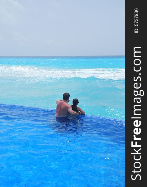 Father and daughter swimming