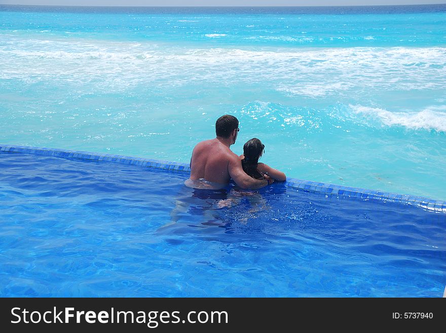 Father and daughter swimming