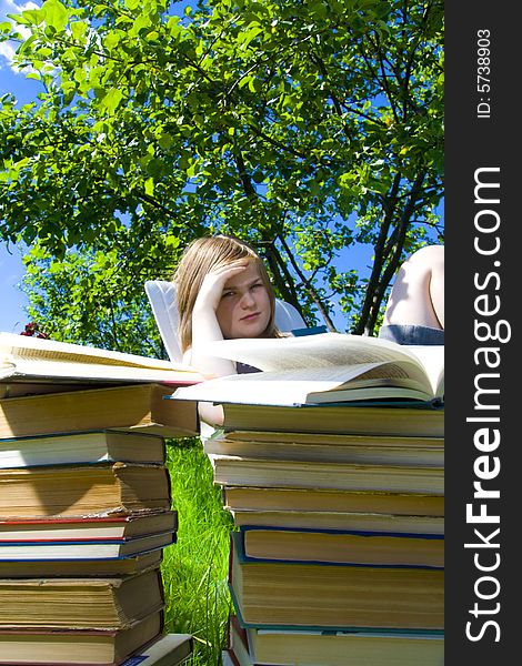 The young attractive student with the book. The young attractive student with the book