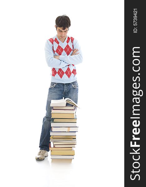 The young student with the books isolated on a white background