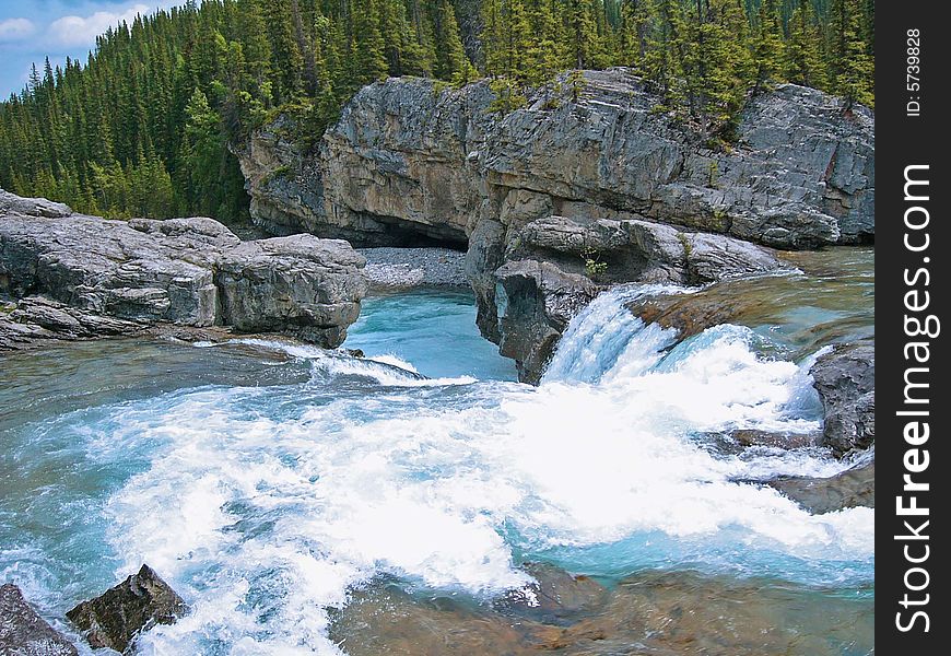 Picture taken from a rock on the shallow end of the elbow falls river. From Alberta, Canada. Picture taken from a rock on the shallow end of the elbow falls river. From Alberta, Canada