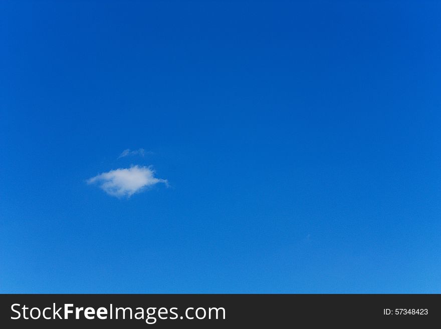 One small cloud in the blue sky