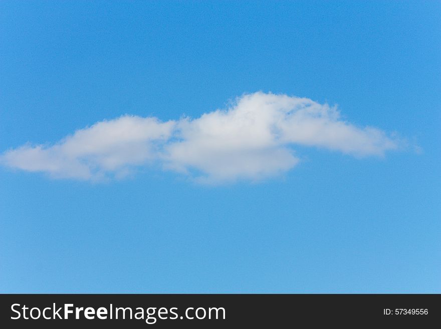 One small cloud in the blue sky