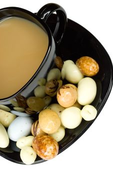 Close-up Black Cup Of Coffee With Milk And Candies Stock Photos Close-up Black Cup Of Coffee With Milk And Candies Stock Photos